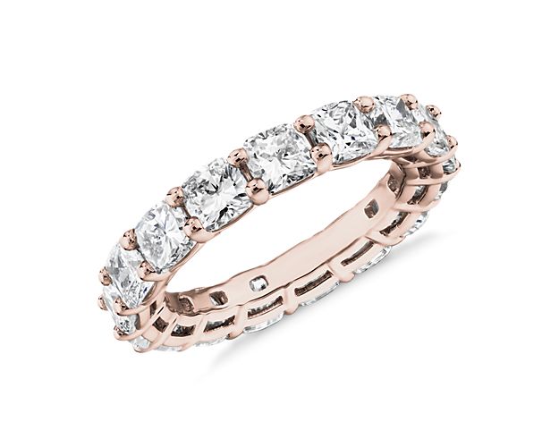 This lab grown diamond cushion-cut eternity ring celebrates the brilliance of love, surrounded by the timeless shine of 14k rose gold.