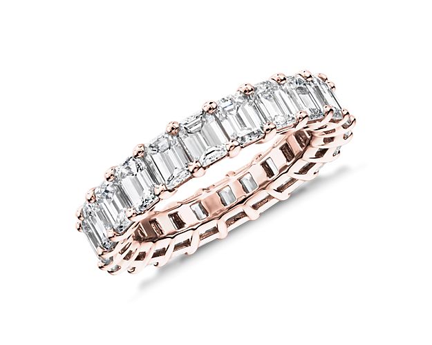 This lab grown diamond emerald-cut eternity ring celebrates the brilliance of love, surrounded by the timeless shine of 14k rose gold.