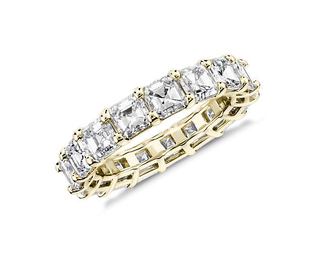 This lab grown diamond asscher-cut eternity ring celebrates the brilliance of love, surrounded by the timeless shine of 14k yellow gold.