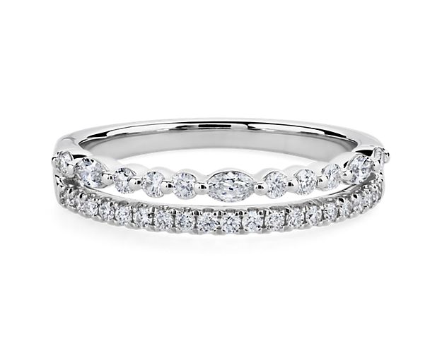 This ring shimmers with unique two-row style, with round-cut diamonds sparkling beautifully next to stunning marquise-cut diamonds. Featuring platinum design, it promises a look of timelessly luxurious beauty.