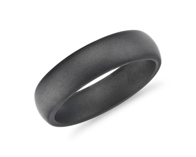 Carefully crafted from tungsten carbide, this modern wedding band provides an industrial and masculine aesthetic combined with an incredible comfort fit.