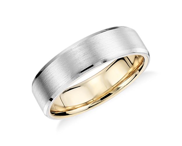 Solidify your love with this platinum and 18k yellow gold wedding ring, showcasing a two-tone interior accent and a brushed finish.