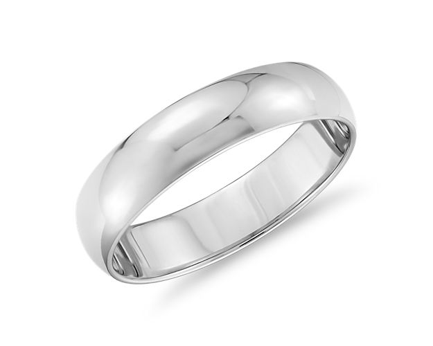 This classic 14k white gold wedding ring will be a lifelong essential. The light overall weight of this style, its classic 5mm width, and low profile aesthetic make it perfect for everyday wear. The high polished finish and goes-with-anything styling are a timeless design.