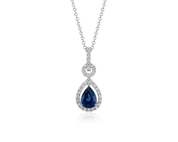 Captivating in color, this sapphire and diamond pendant features a pear-shaped sapphire with a vibrant blue hue pavé-set with round diamonds. It is beautifully set in 14k white gold with a matching cable chain and makes an elegant gift for someone special.