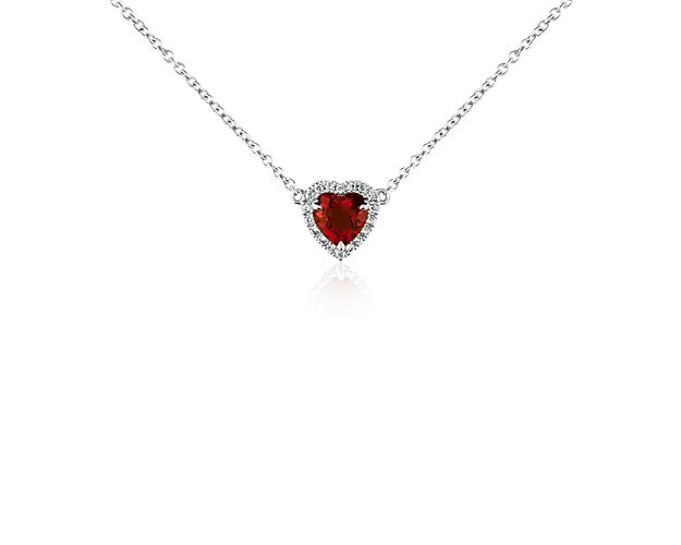 Striking and brilliant, this heart-shaped pendant showcases a rich garnet  framed by micropavé diamonds set in 18k white gold with a matching cable chain necklace.