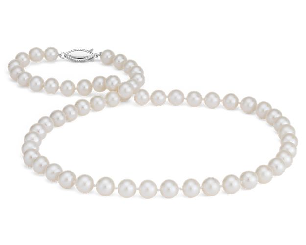 Our classic pearl strand features nearly round freshwater cultured pearls strung on a 16" hand-knotted silk blend cord, secured with a 14k white gold safety clasp. Blue Nile gemologists ensure that our pearls meet the highest quality expectations, ensuring you the best value.