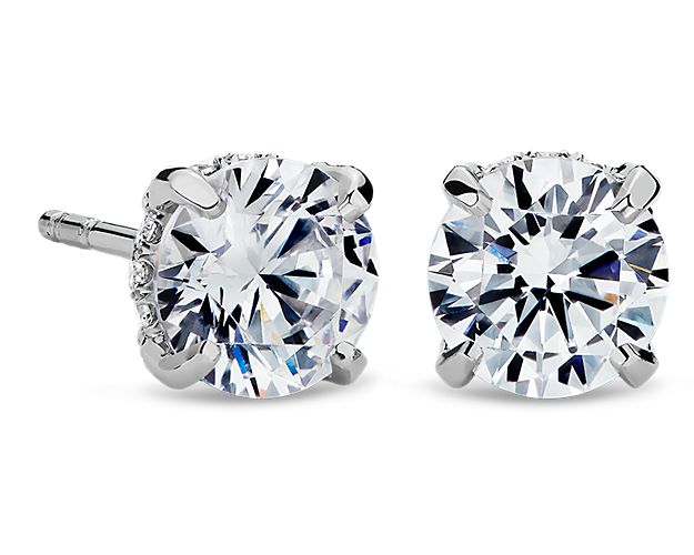 These classic platinum earring settings will compliment your choice of round diamonds. Each earring is French pavé-set with round diamonds for a brilliant finishing touch.