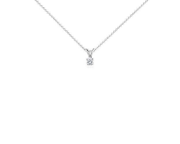 Indulge with this solitaire diamond pendant, featuring a 14k white gold cable chain necklace and lobster claw clasp.