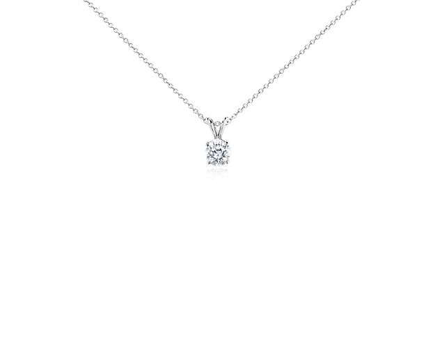 Indulge with this solitaire diamond pendant, featuring a 14k white gold cable chain necklace and lobster claw clasp.