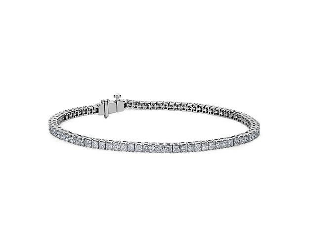 Brilliance defined, this tennis bracelet features brilliant cut round lab-grown diamonds set in a four-prong straight line design of 14k white gold.