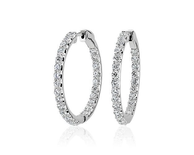 Gorgeously shimmering and timelessly elegant, these eternity hoop earrings feature lab-grown diamonds set along the front-facing edges and are a breath-taking addition to your look. They are designed in lustrous 14k white gold for luxurious quality that endures.