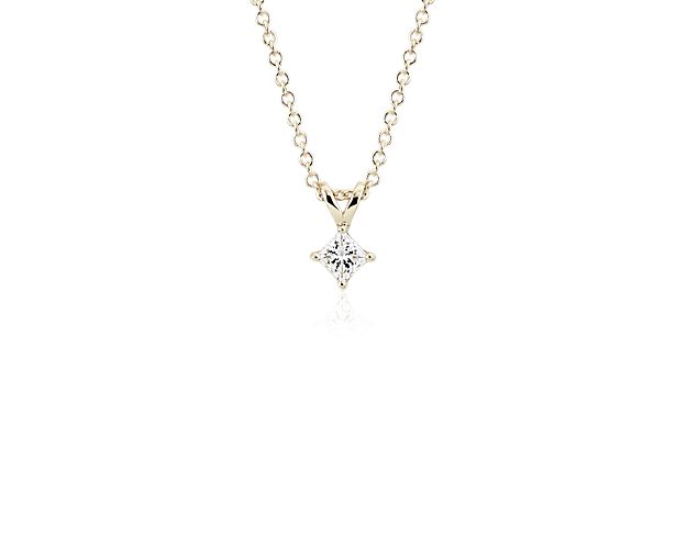 Classically elegant, this cable chain diamond necklace features a striking princess cut diamond set in 14k yellow gold.