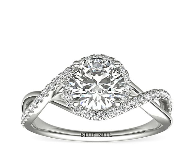 Classic with a twist, this 14k white gold engagement ring features a delicate twist of pavé-set diamonds that will complement the center diamond of your choice.