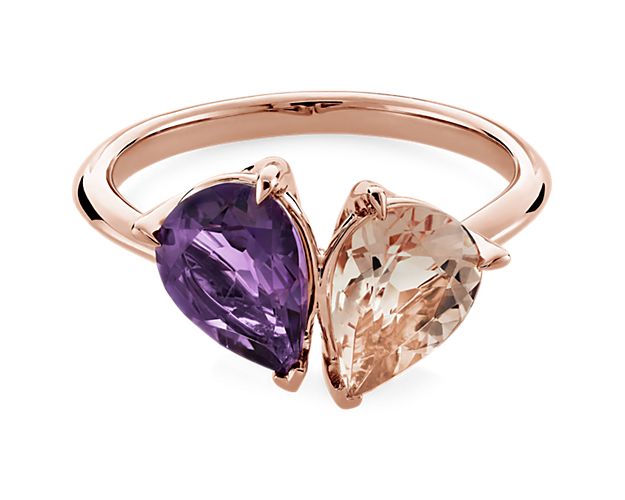 This stunning two stone ring features a shimmering pear-cut amethyst stone and morganite stone in a gorgeous pairing. The lustrous 14k rose gold complements the beautiful hues of the stones.