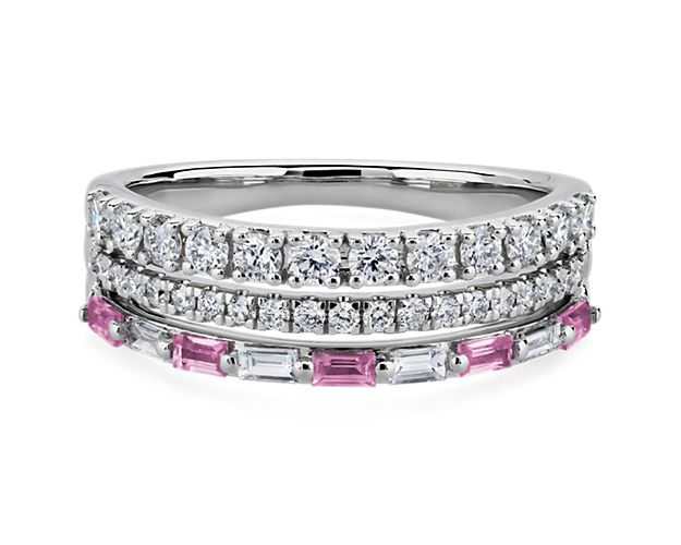 Shimmering pave-set diamonds sparkle from this ring featuring triple-banded design in lustrous platinum. The third row is beautifully set with alternating baguette-cut diamonds and pink sapphires.