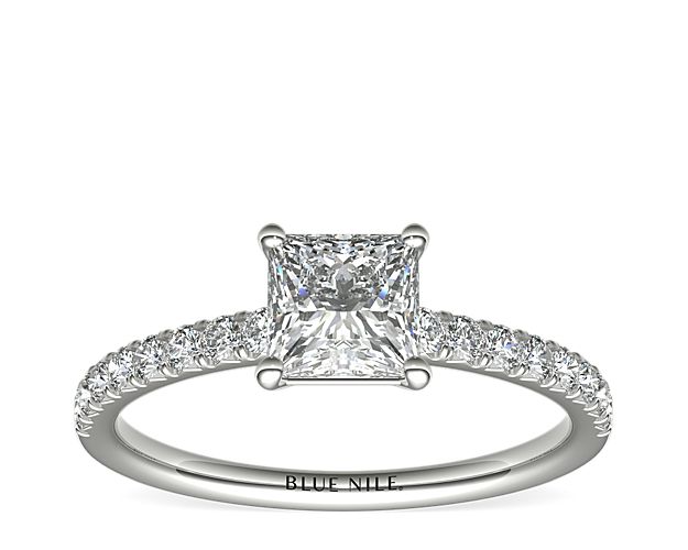 Eyes will be fixated on this immaculate platinum diamond engagement ring, showcasing French pavé-set diamonds that complement your choice of center diamond.