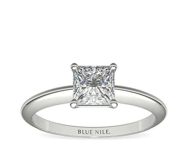 Let your diamond shine brilliantly in this classic platinum four-prong solitaire engagement ring. The slim silhouette and polished finish exemplify timeless style. Select from a variety of diamond shapes to create the perfect classic solitaire engagement ring for you.