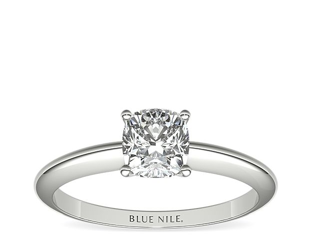 Let your diamond shine brilliantly in this classic platinum four-prong solitaire engagement ring. The slim silhouette and polished finish exemplify timeless style. Select from a variety of diamond shapes to create the perfect classic solitaire engagement ring for you.