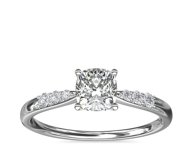 Complement your center diamond perfectly with this 14k white gold engagement ring accented with pavé-set diamonds along the shank.