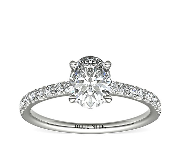 Eyes will be fixated on this immaculate platinum diamond engagement ring, showcasing French pavé-set diamonds that complement your choice of center diamond.