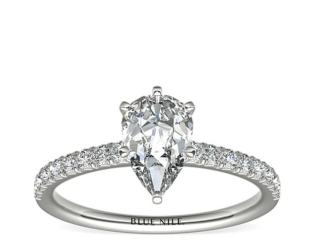 Eyes will be fixated on this immaculate platinum diamond engagement ring, showcasing French pavé-set diamonds that complement your choice of center diamond.