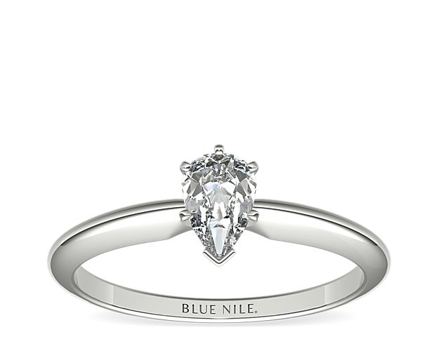 This 14k white gold, six-prong solitaire is the ultimate classic engagement ring style. Crafted to showcase your choice of diamond, six slim prongs secure and support the center stone. The slender silhouette and polished finish of this solitaire exemplify timeless design, proving simple can be truly stunning.