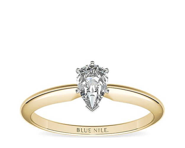 This 18k yellow gold, six-prong solitaire is the ultimate classic engagement ring style. Crafted to showcase your choice of diamond, six slim platinum prongs secure and support the center stone. The slender silhouette and polished finish of this solitaire exemplify timeless design, proving simple can be truly stunning.