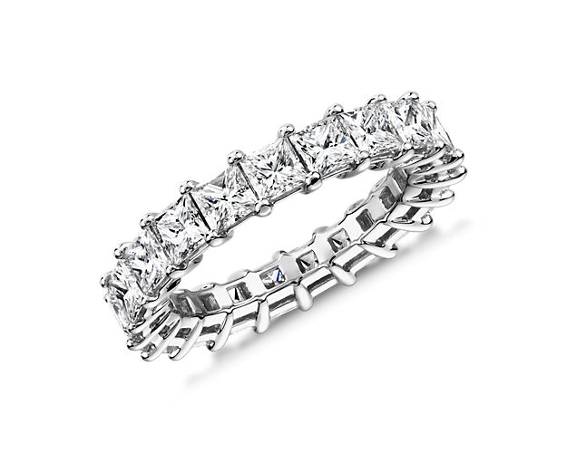 This 4 ct. tw. eternity ring celebrates the brilliance of love with a regal array of princess-cut diamonds surrounding the timeless shine of platinum.