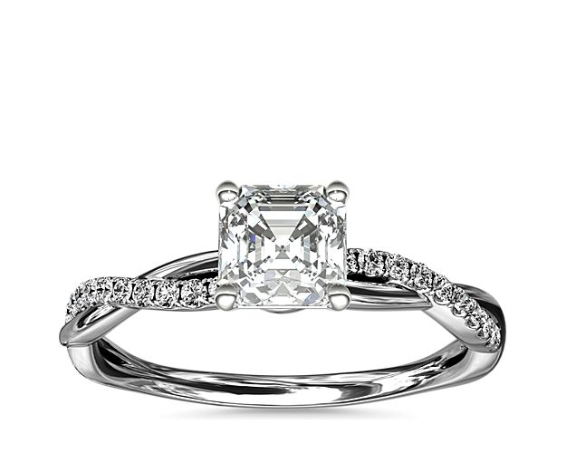 Classic with a twist, this 14k white gold engagement ring features a delicate twist of pavé-set diamonds that will complement the center diamond of your choice.