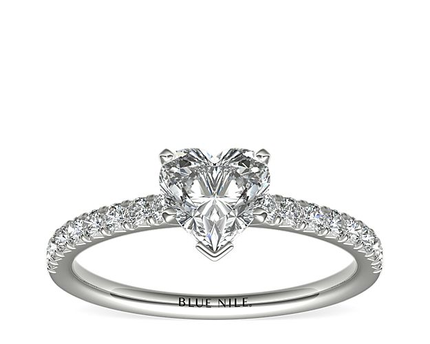 Eyes will be fixated on this immaculate platinum diamond engagement ring, showcasing French pavé-set diamonds that complement your choice of center diamond.