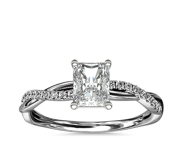 Classic with a twist, this 14k white gold engagement ring features a delicate twist of pavé-set diamonds that will complement the center diamond of your choice.