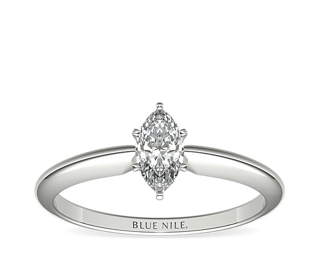 This 14k white gold, six-prong solitaire is the ultimate classic engagement ring style. Crafted to showcase your choice of diamond, six slim prongs secure and support the center stone. The slender silhouette and polished finish of this solitaire exemplify timeless design, proving simple can be truly stunning.