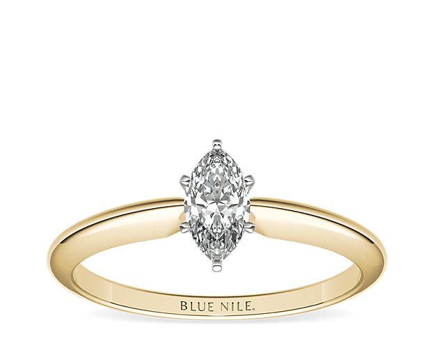 This 18k yellow gold, six-prong solitaire is the ultimate classic engagement ring style. Crafted to showcase your choice of diamond, six slim platinum prongs secure and support the center stone. The slender silhouette and polished finish of this solitaire exemplify timeless design, proving simple can be truly stunning.