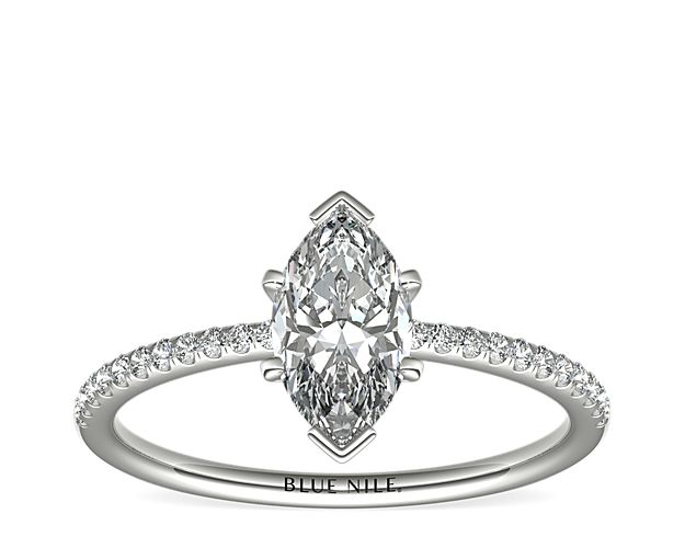 Delicate and beautiful, this diamond engagement ring in platinum features a half circle of sparkling petite micropavé diamonds to complement your center diamond.