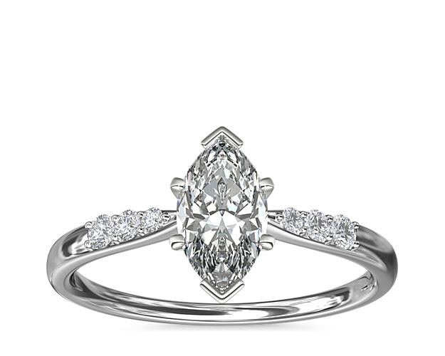 Complement your center diamond perfectly with this 14k white gold engagement ring accented with pavé-set diamonds along the shank.