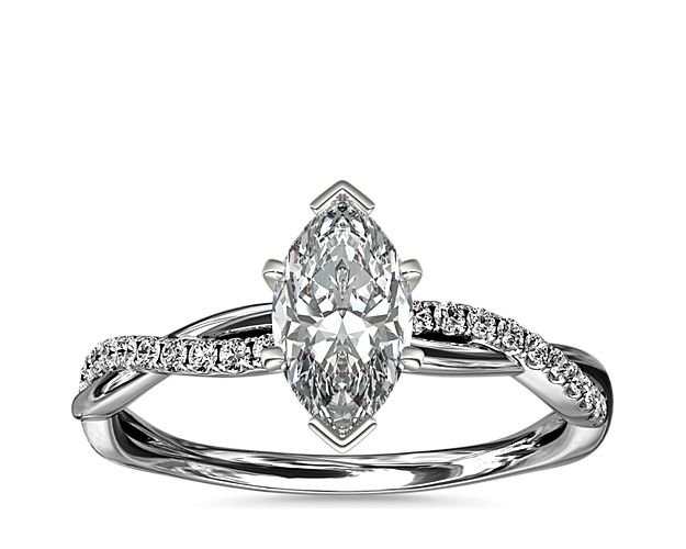 Classic with a twist, this 14k white gold engagement ring features a delicate twist of pavé-set diamonds that will complement the center diamond of your choice.