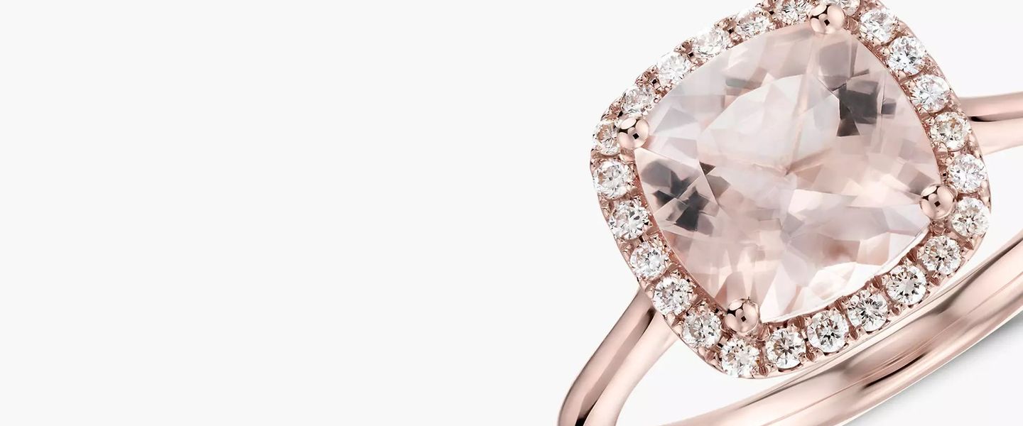 A large cushion cut morganite gemstone engagement ring